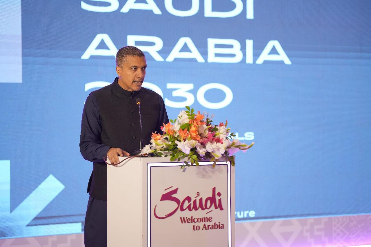 Silk and Sands founder speaking at a Saudi tourism industry event