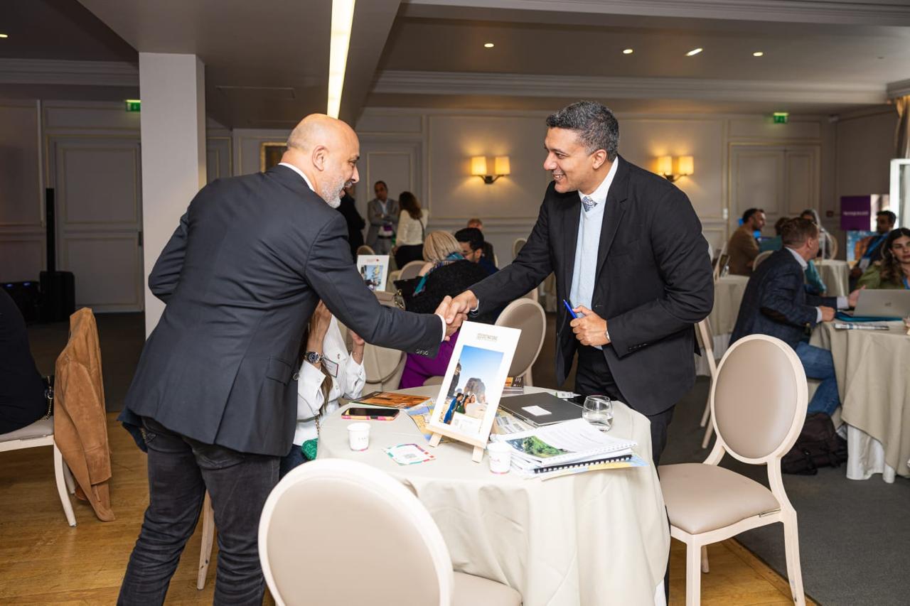 Business partners meeting at a tourism industry event